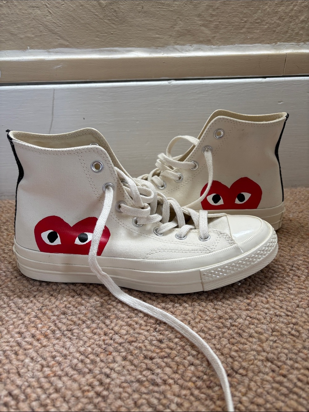Comme des Garcons PLAY White High-Top Sneakers with Red Heart